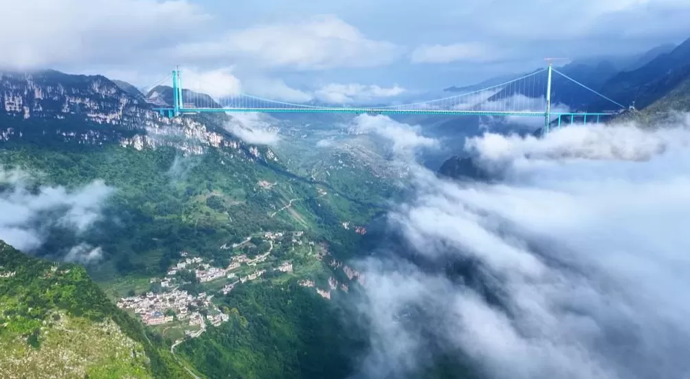花江“桥”见丨花江峡谷大桥：云雾中的世界级奇观-第2张图片-