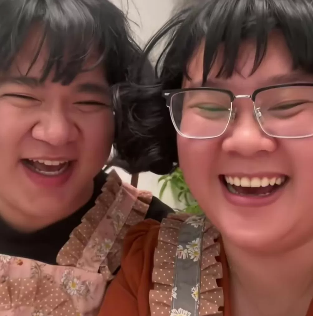 广东一对夫妻长“复制粘贴脸”走红，网友：谁是老公？-第1张图片-