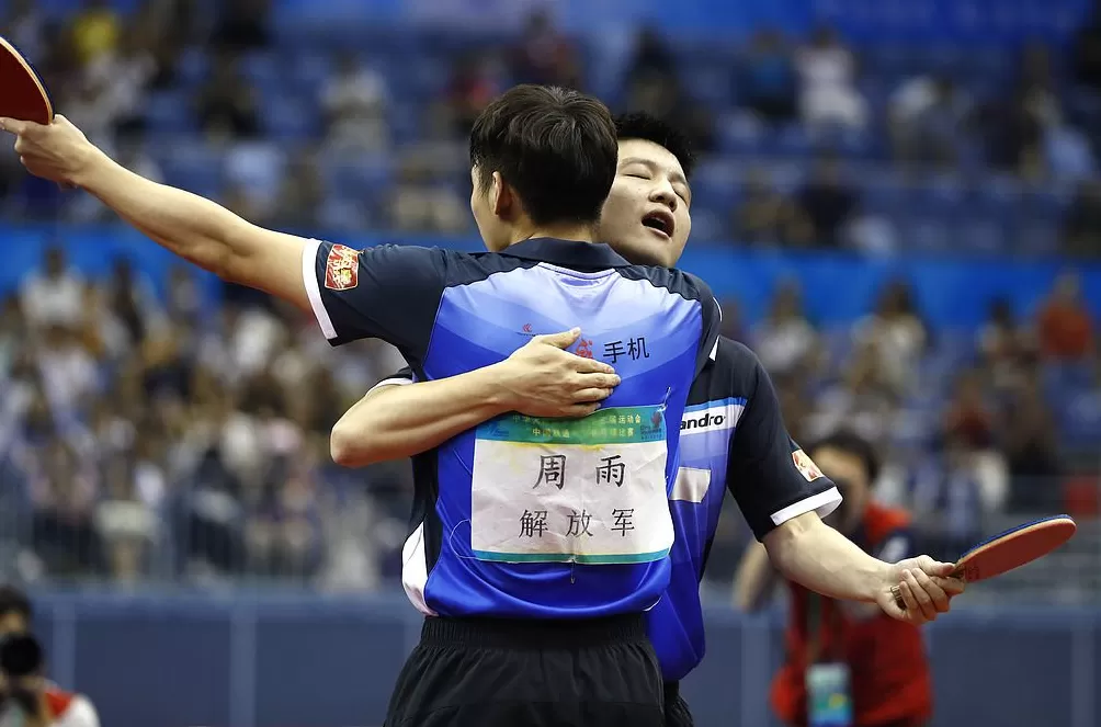 樊振东战胜周雨，晋级全运会乒乓球男单16强-第2张图片-