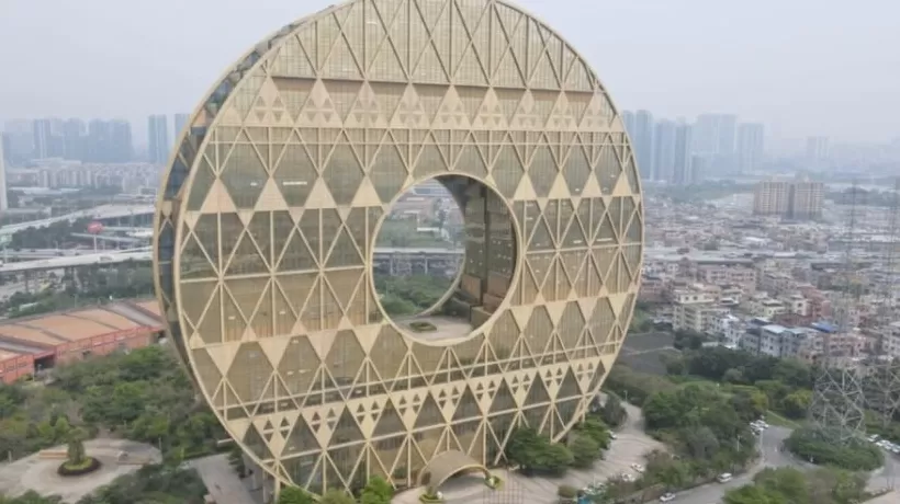 广州“铜钱大厦”降价近1.4亿元二拍，曾被戏称为“最丑建筑”-第2张图片-