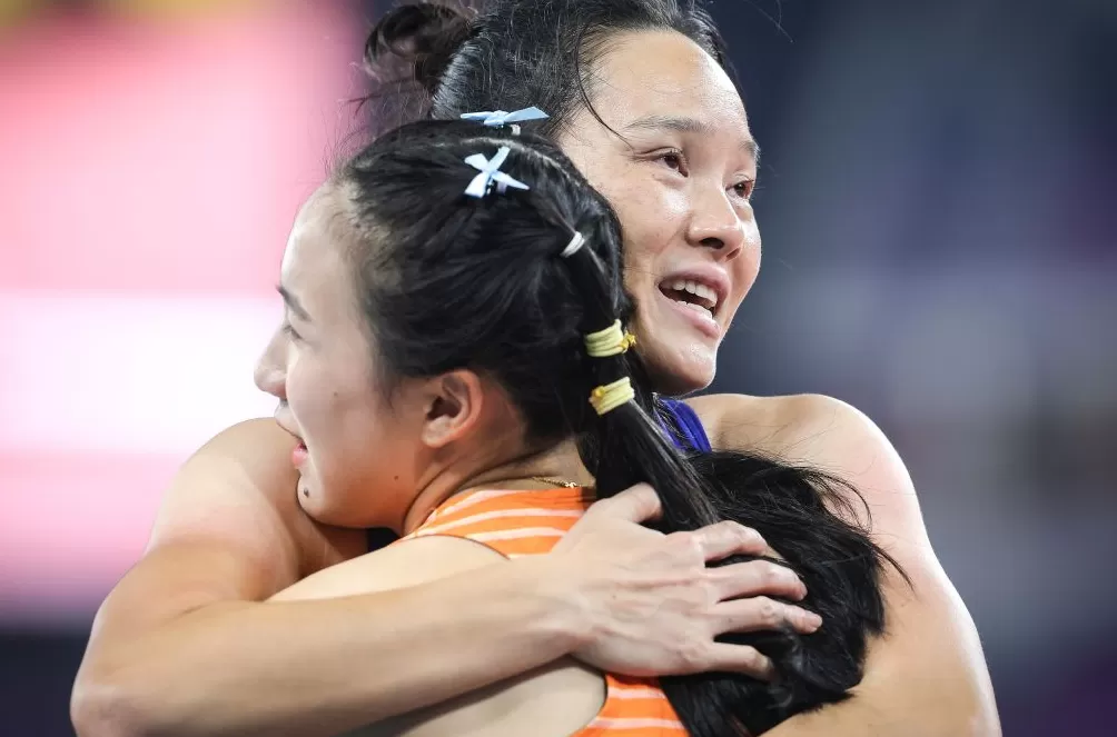 荣耀终章｜从打工妹到田径队大姐，爱笑的韦永丽写就一段传奇-第10张图片-